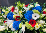 Casket Arrangement Red, White and Blue