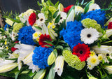 Casket Arrangement Red, White and Blue
