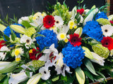 Casket Arrangement Red, White and Blue